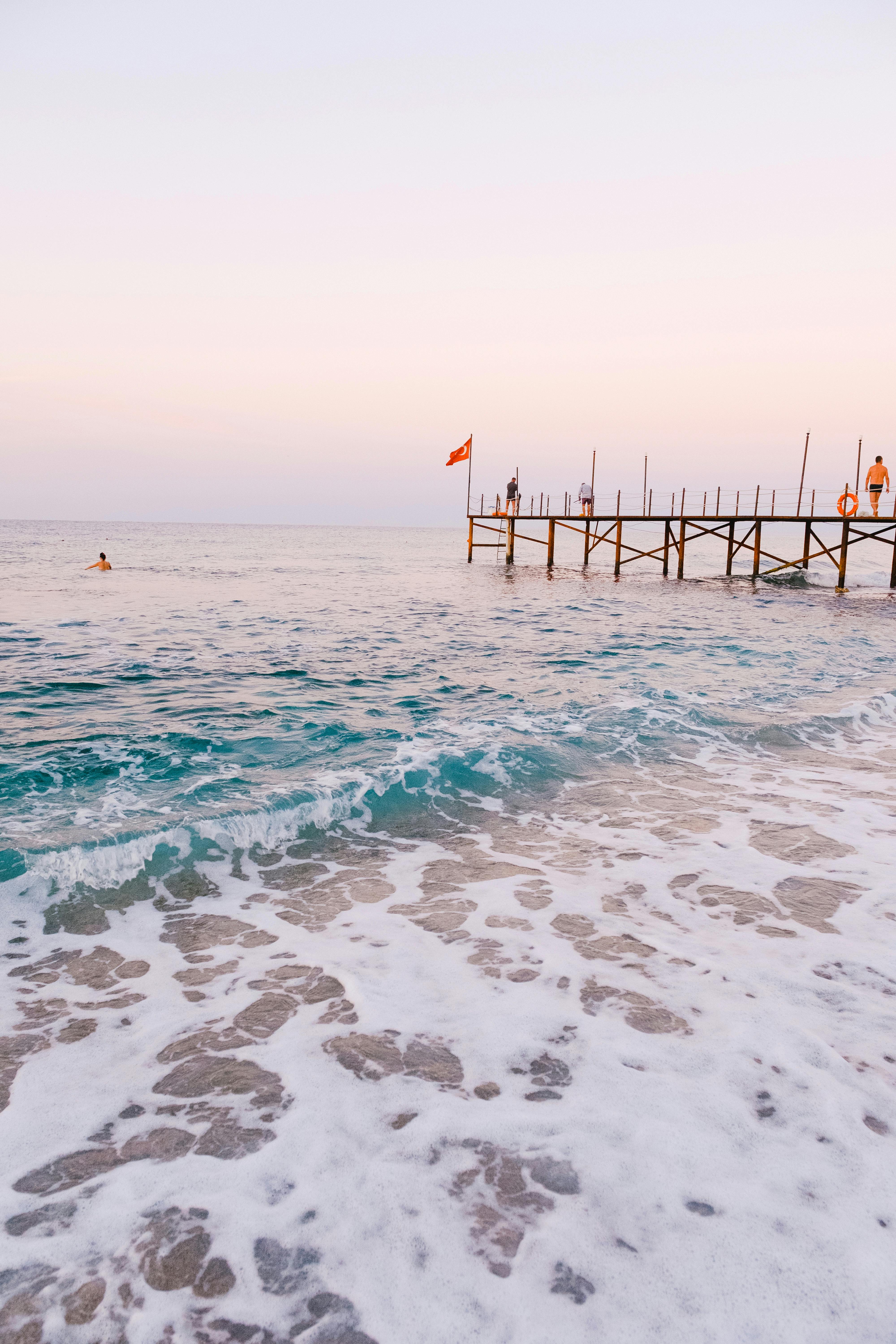 Can you swim with a yellow flag?