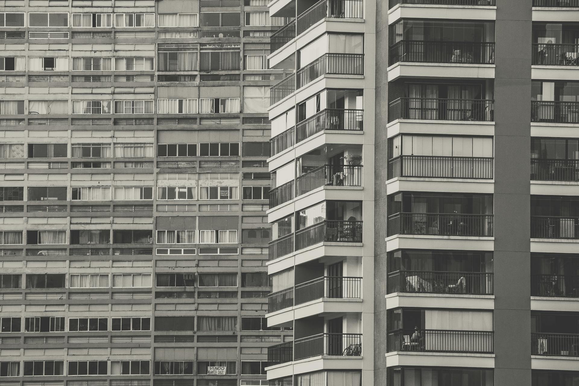 Gray-scale Photography of a Condominium Building