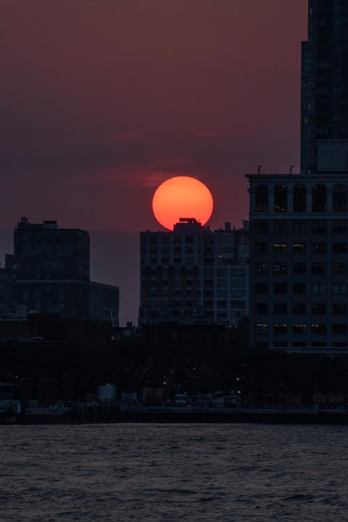 夕日を背景, 夕景, 夕焼けの無料の写真素材