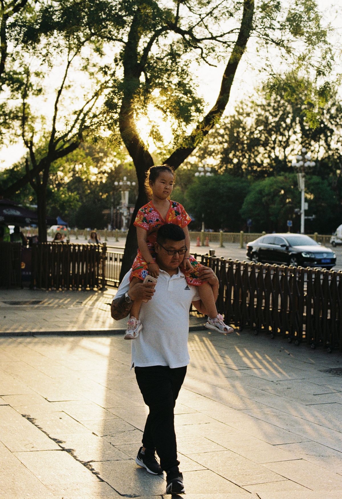 Man Carrying Boy on His Shoulder · Free Stock Photo