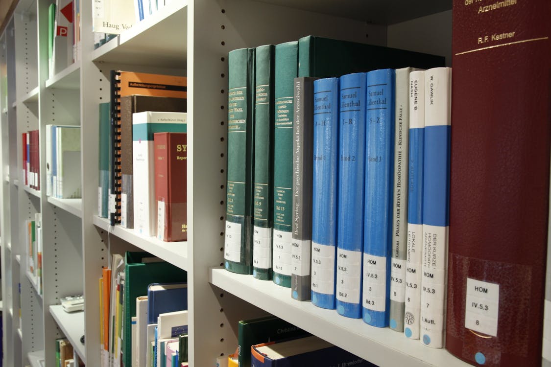 Free Books on Shelf in Library Stock Photo