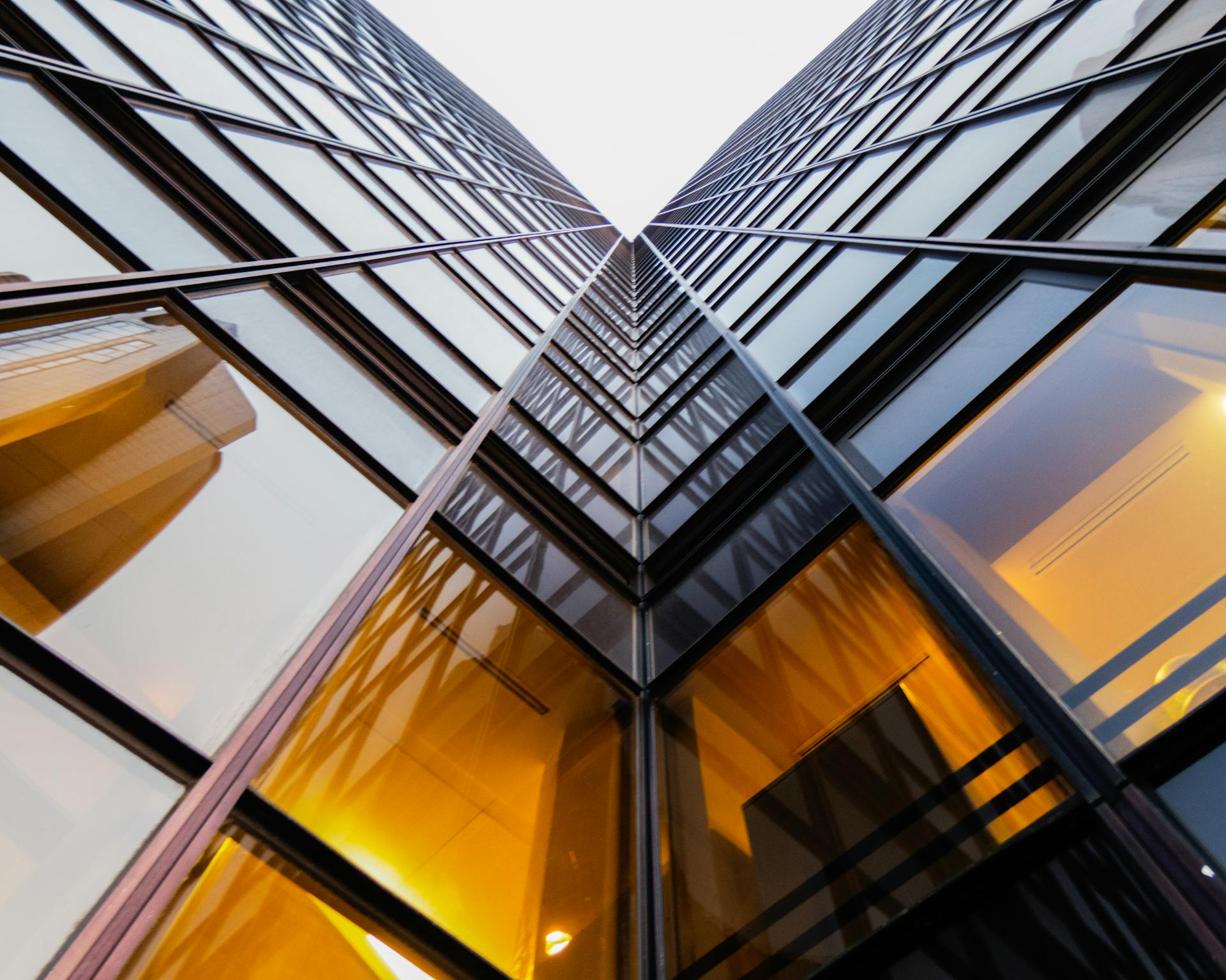 Low angle photo of a glass building