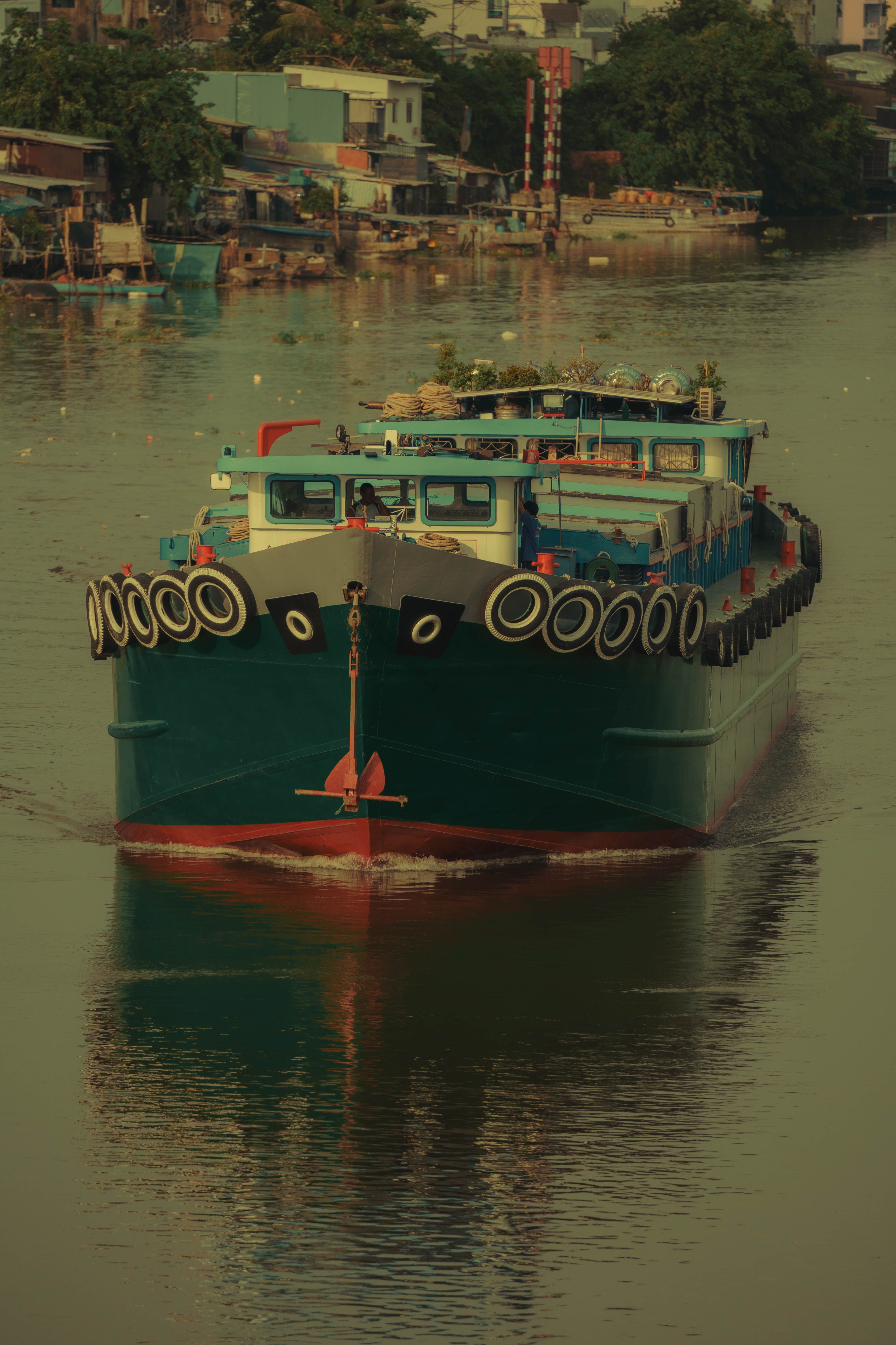 View of a Ferry Crossing the Body of Water · Free Stock Photo