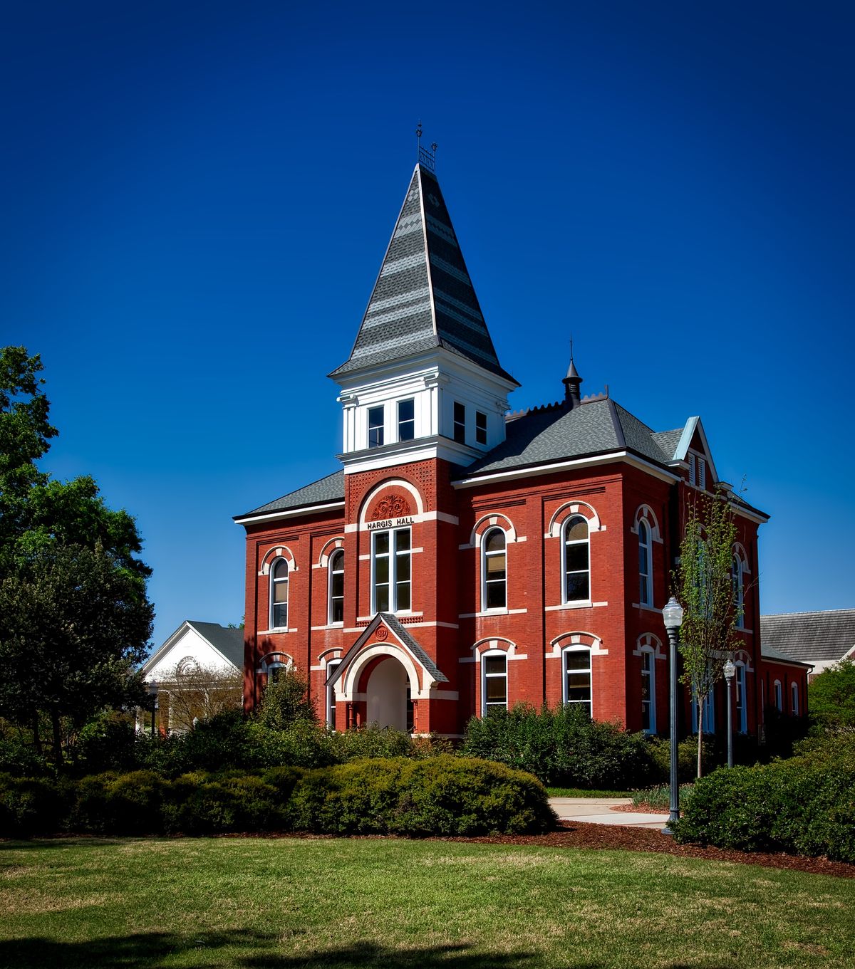 Historic red-brick hall at the heart of campus