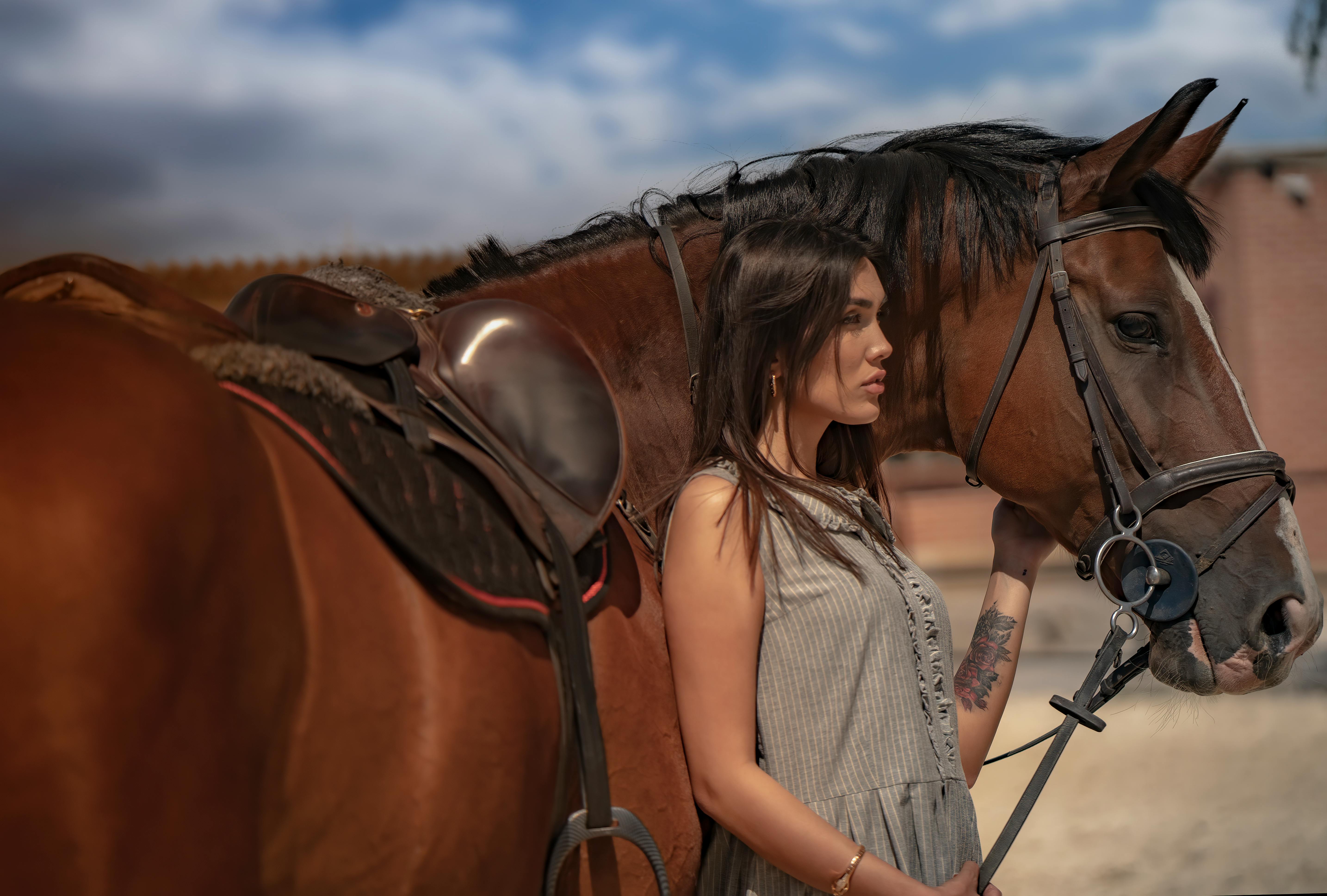 cow girl with her horse