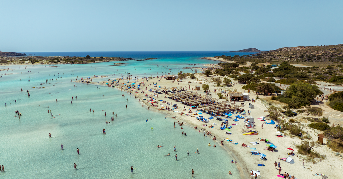 Discover the pristine sands and turquoise waters of Elafonissi Beach, Crete, Greece, from above.