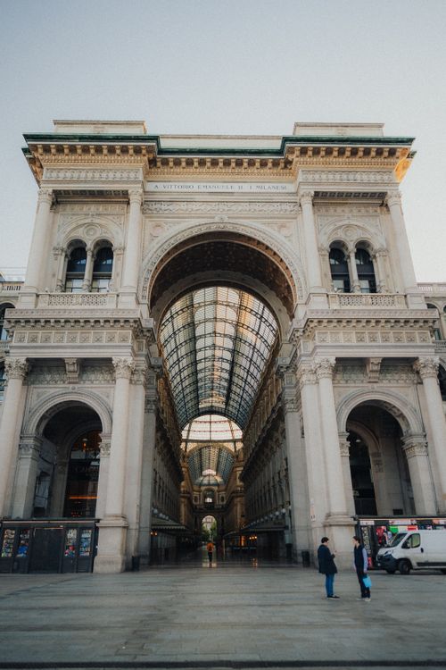 Free Iconic Galleria Vittorio Emanuele II's grand entrance in Milan, Italy, showcasing its stunning architecture. Stock Photo