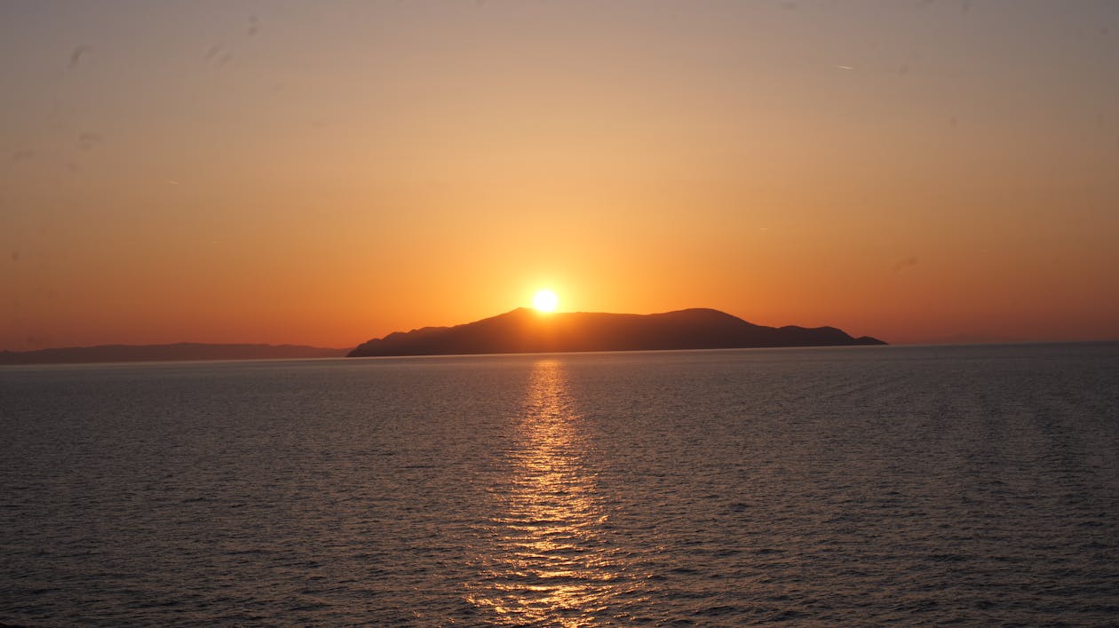 Foto profissional grátis de mykonos, pôr do sol