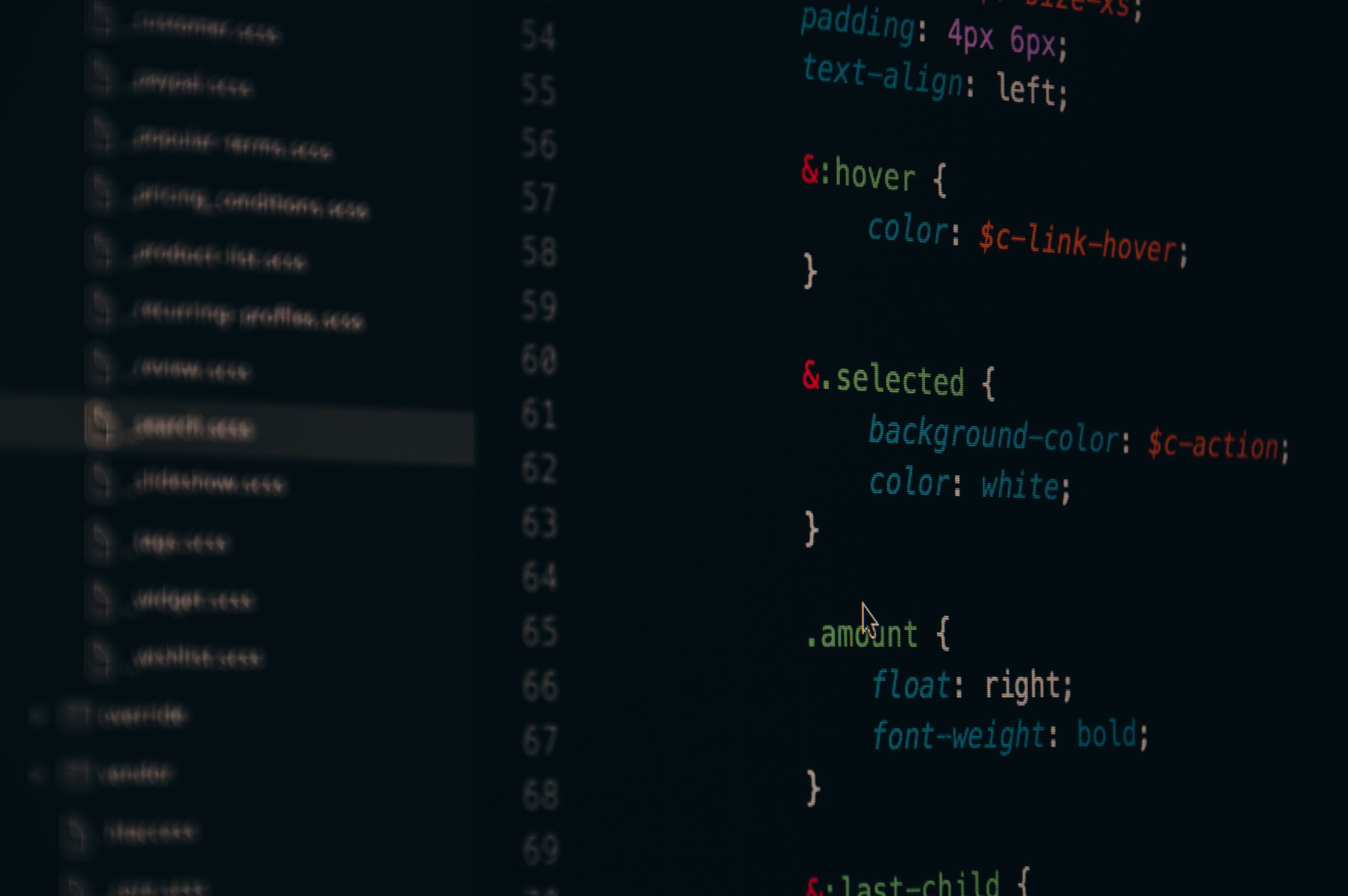 Close-up of colorful CSS code lines on a computer screen for web development.