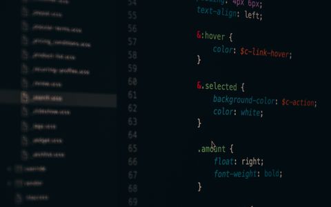 Close-up of colorful code on a computer screen