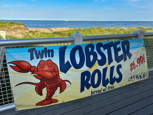 Twin Lobster Rolls Advertisement at the Beach