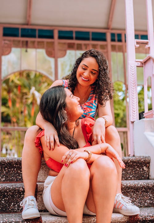 A Couple Sitting On the Stairs