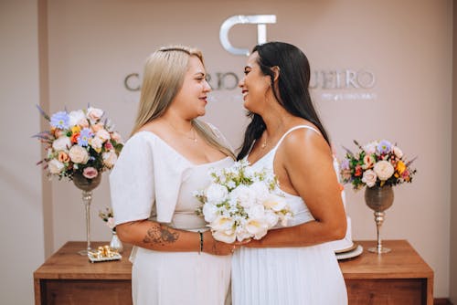 Newlywed Couple Looking Into Each Others Eyes