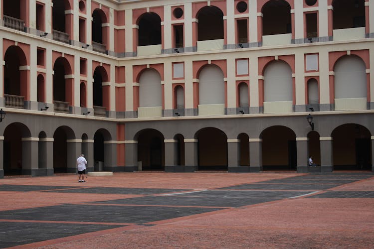 Student Standing On School Ground