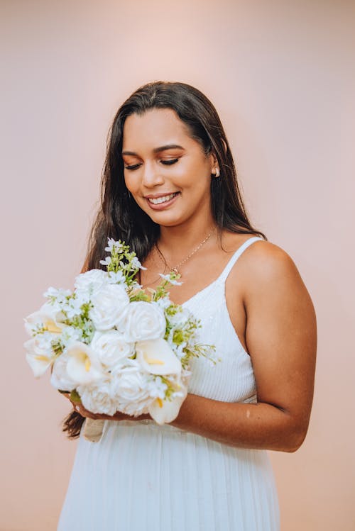 Woman Holding Her Wedding Flowers