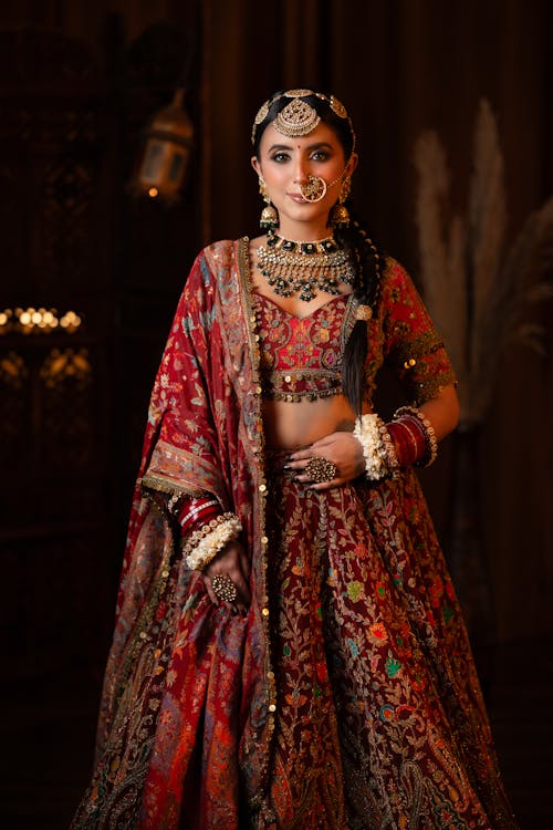 A beautiful indian bride in a red lehenga
