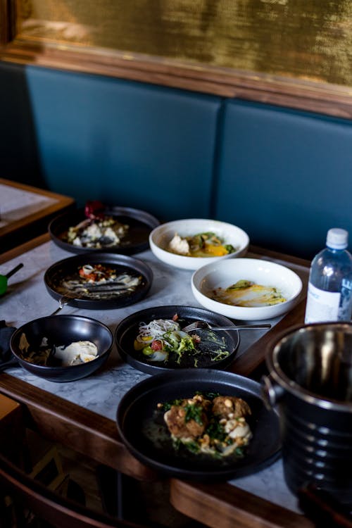 Free Round Black-and-white Ceramic Bowl Lot Inside Well Lit Room Stock Photo