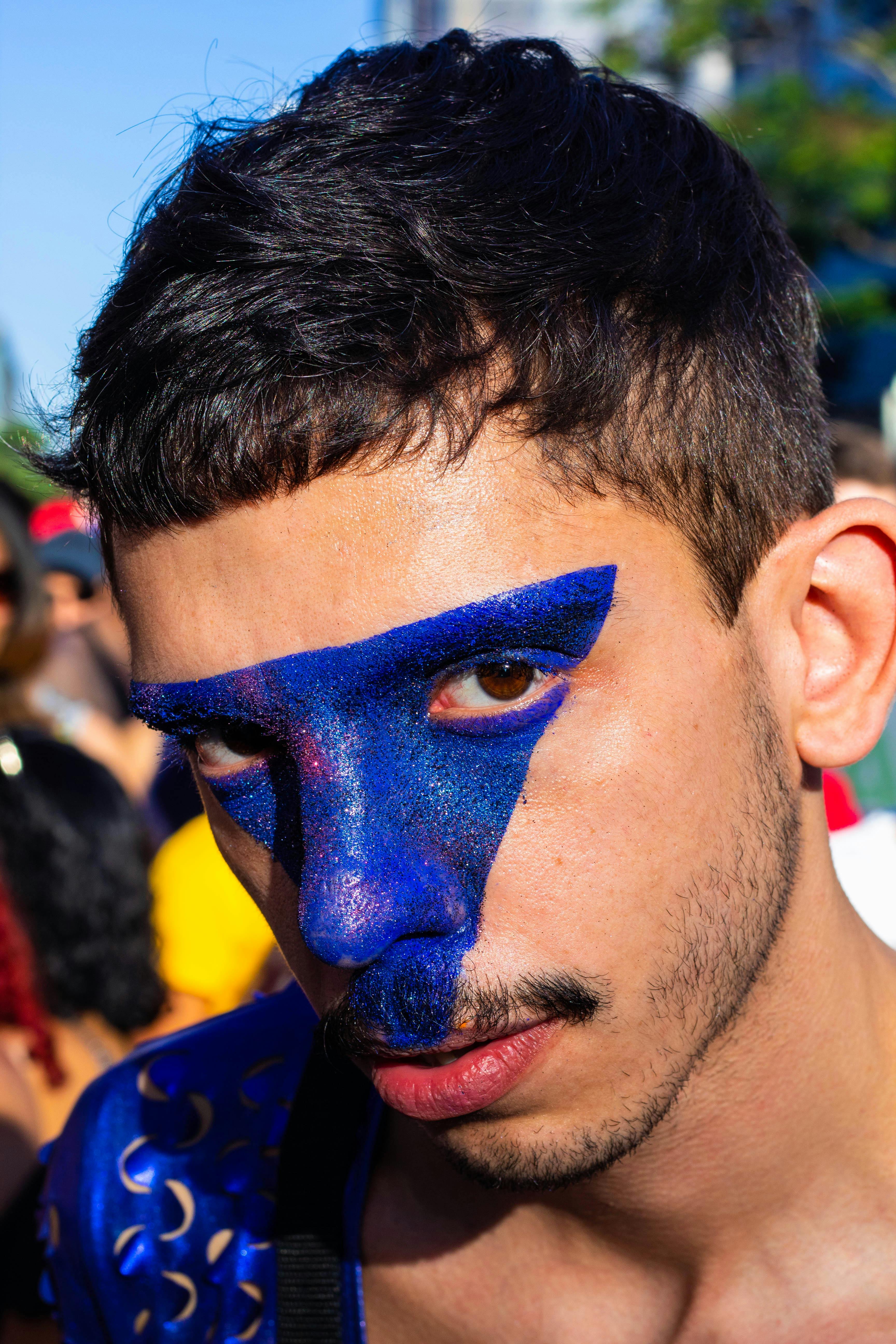 Close-Up Photo of Man With Blue Face Paint · Free Stock Photo