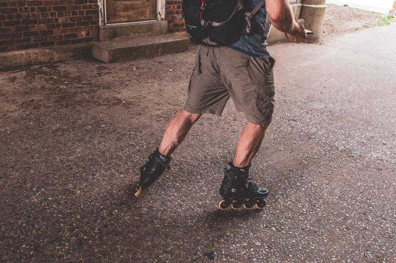 Man rollerblading on an urban surface