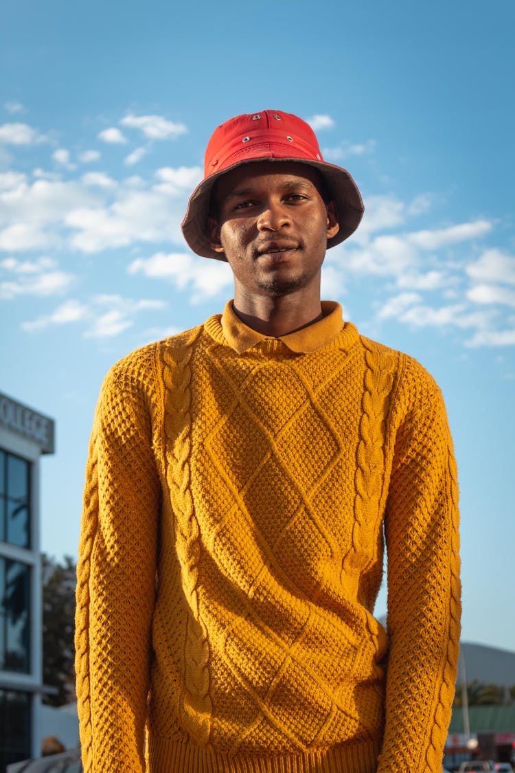 Stylish Black Man In Yellow Knitted Sweater On Street