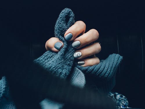 Blue Knitted Clothing And Nails