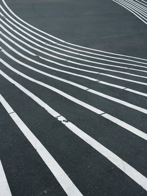 Free White lines on blck surface Stock Photo