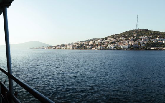Serene view of Istanbul's Princes' Islands, featuring picturesque hills and coastal town