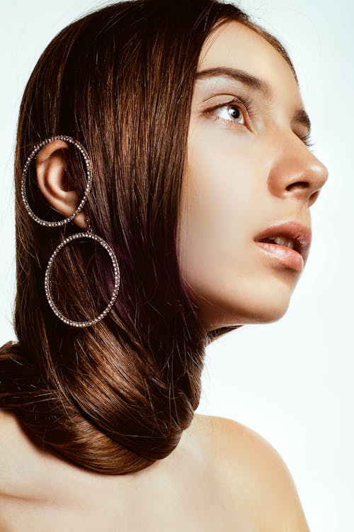 Photo Of Woman Wearing Earings