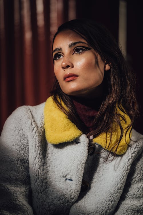 Woman in Gray and Yellow Fleece Coat