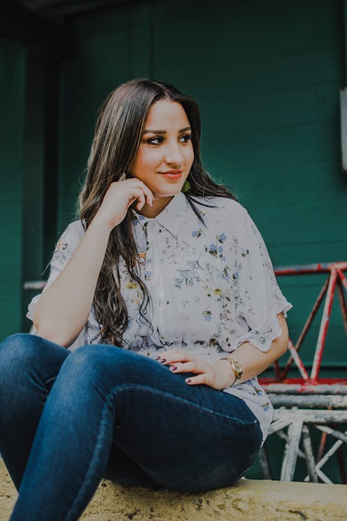 Photo of Woman Wearing Blue Jeans