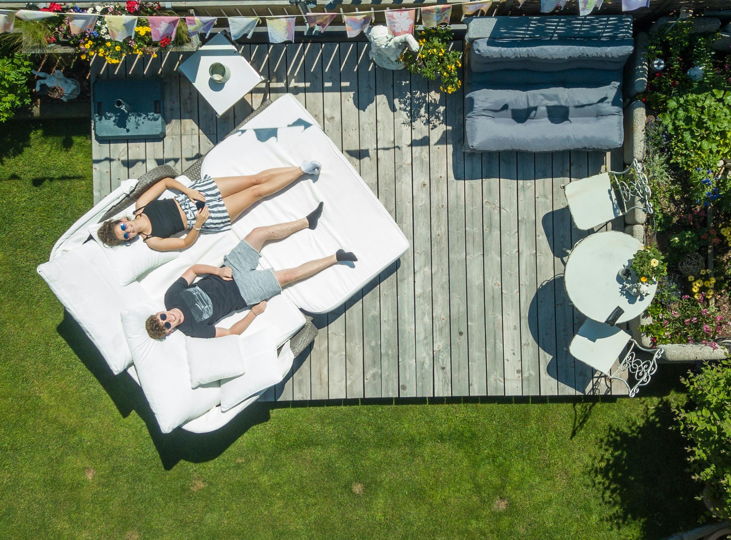 Man And Woman Lying On Mattress · Free Stock Photo