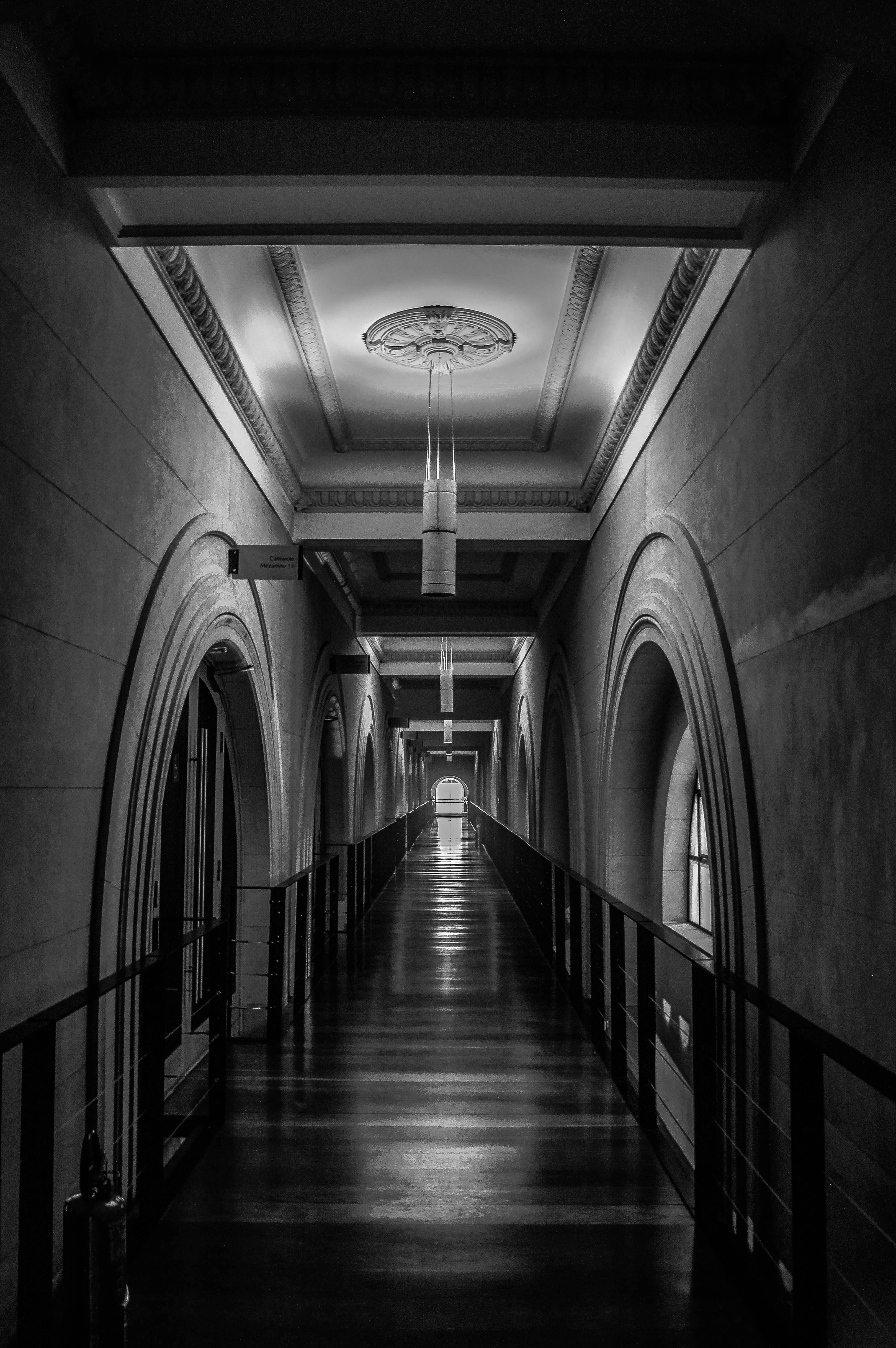 Grayscale Photo of Empty Hallway · Free Stock Photo