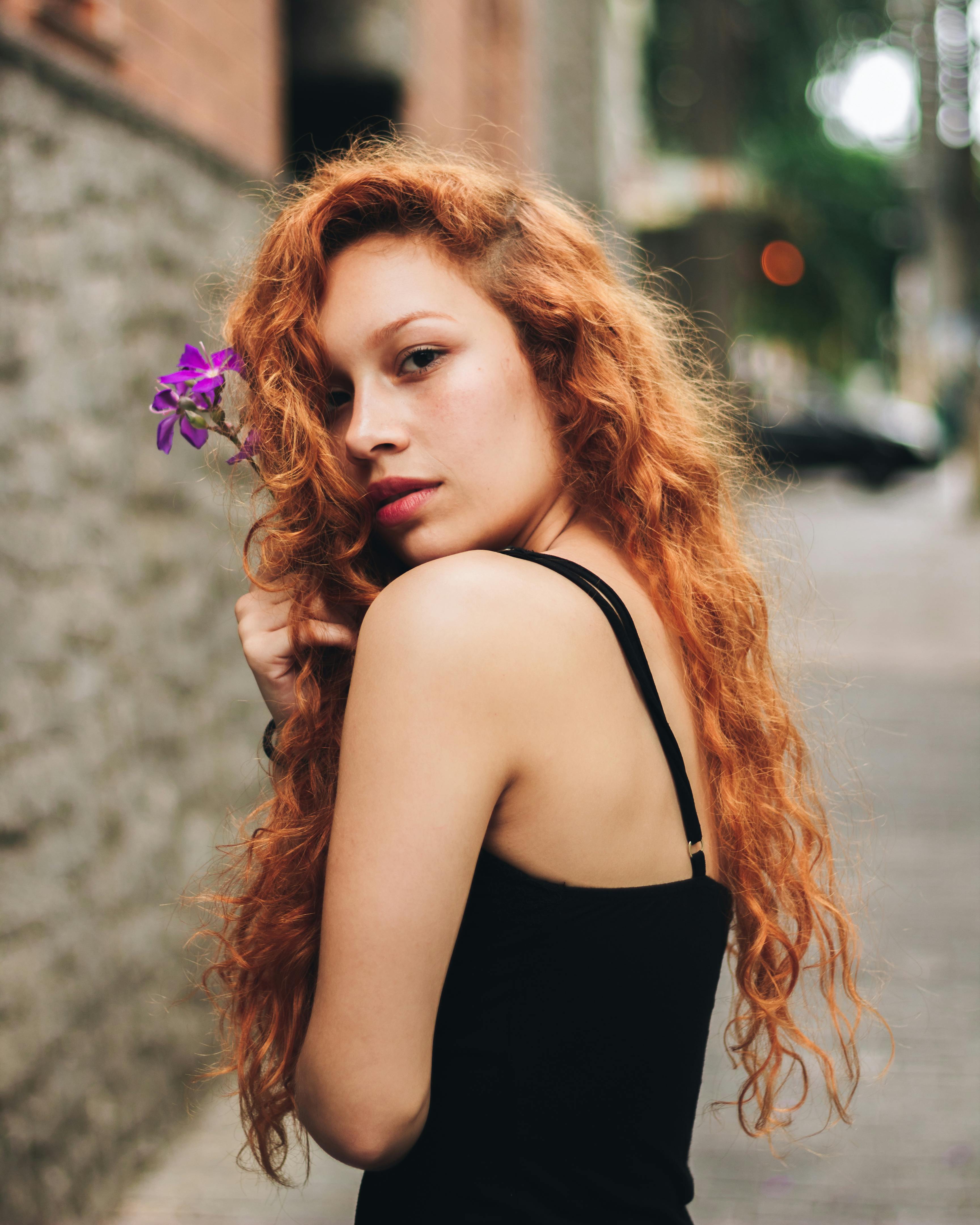 portrait of woman wearing black top