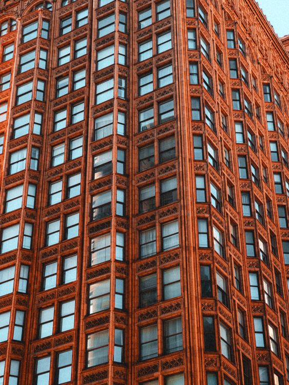 Red Exterior of Modern Tall Apartment Building with Many Windows · Free ...