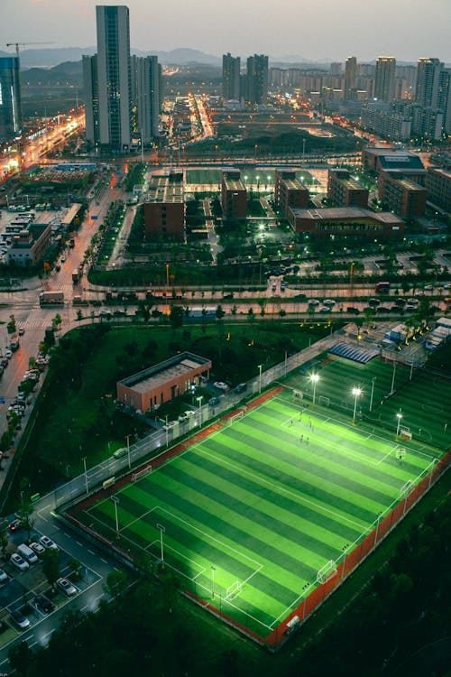 A soccer field in the middle of a city