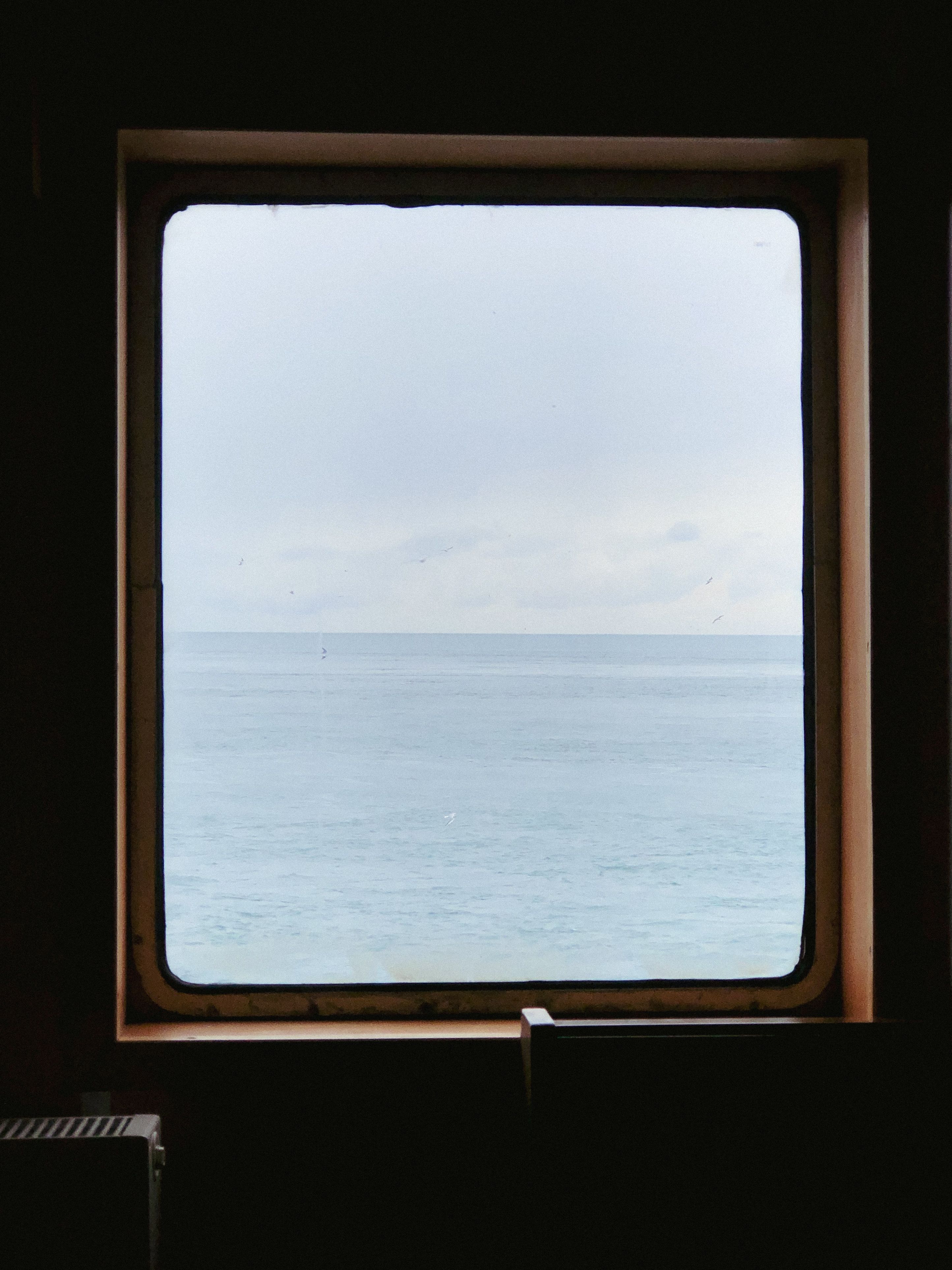 Breathtaking VIew of Ocean from Window · Free Stock Photo