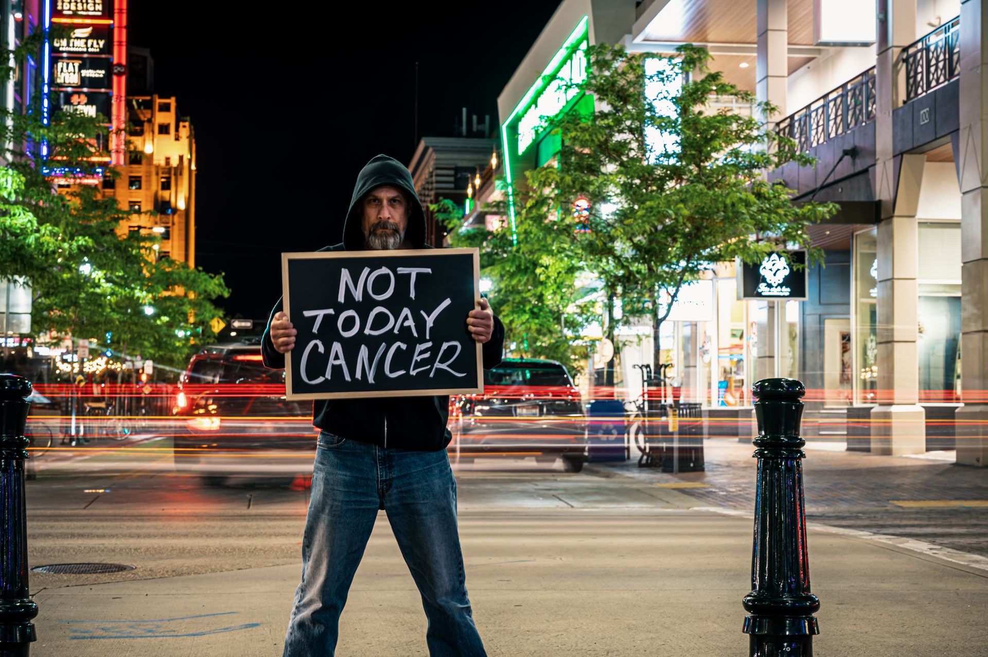 Photo Of Man holding A Signage