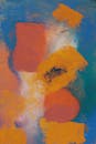 An abstract painting with orange, blue and yellow colors