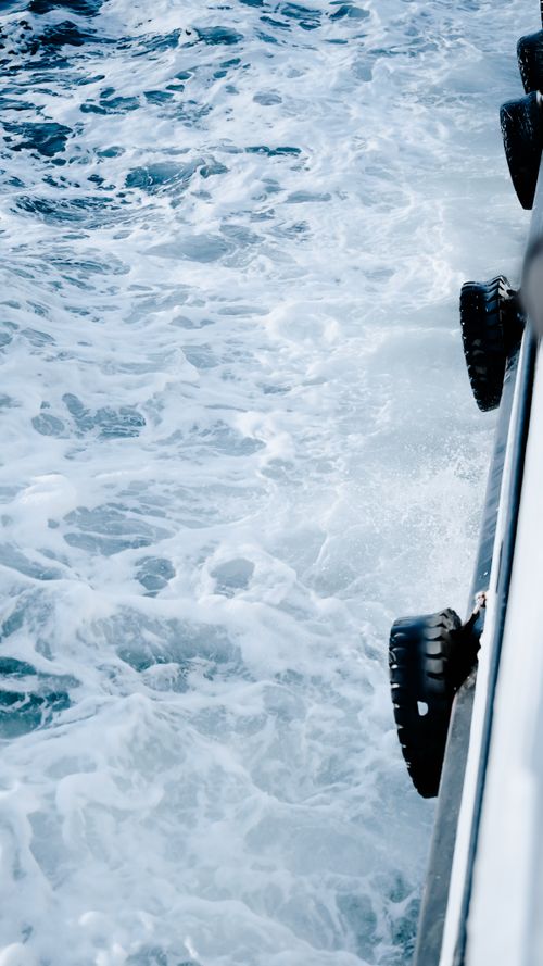 Free Dynamic ocean waves hitting a ship's hull, showcasing vibrant marine scenery in İstanbul, Türkiye. Stock Photo