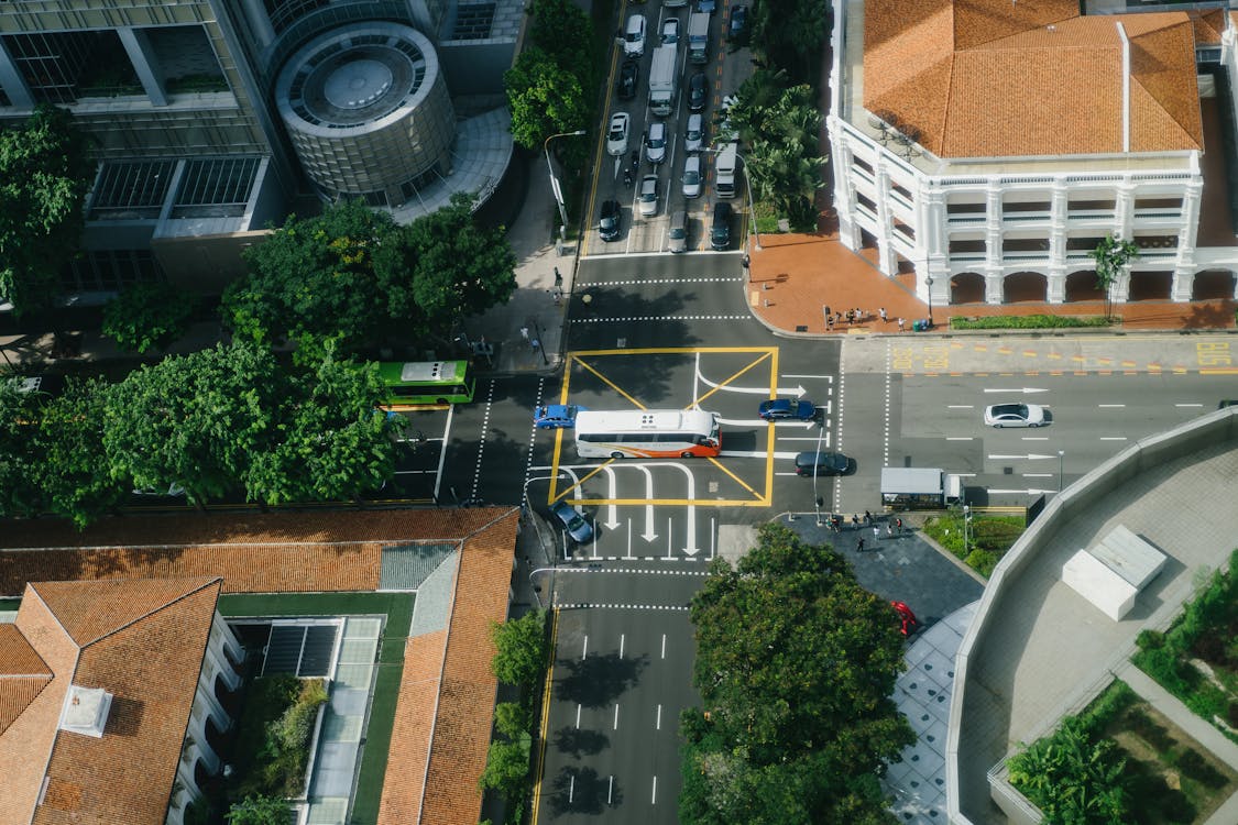 Free Aerial Photography Of Vehicles On Road Near Buildings Stock Photo