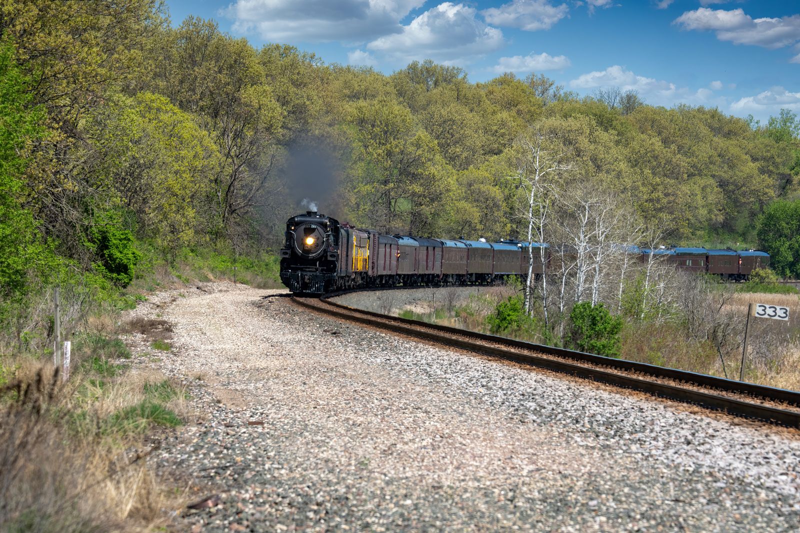 Steam Engine Rolling Vintage Steam Locomotive Rolling Along the Forest · Free Stock Photo