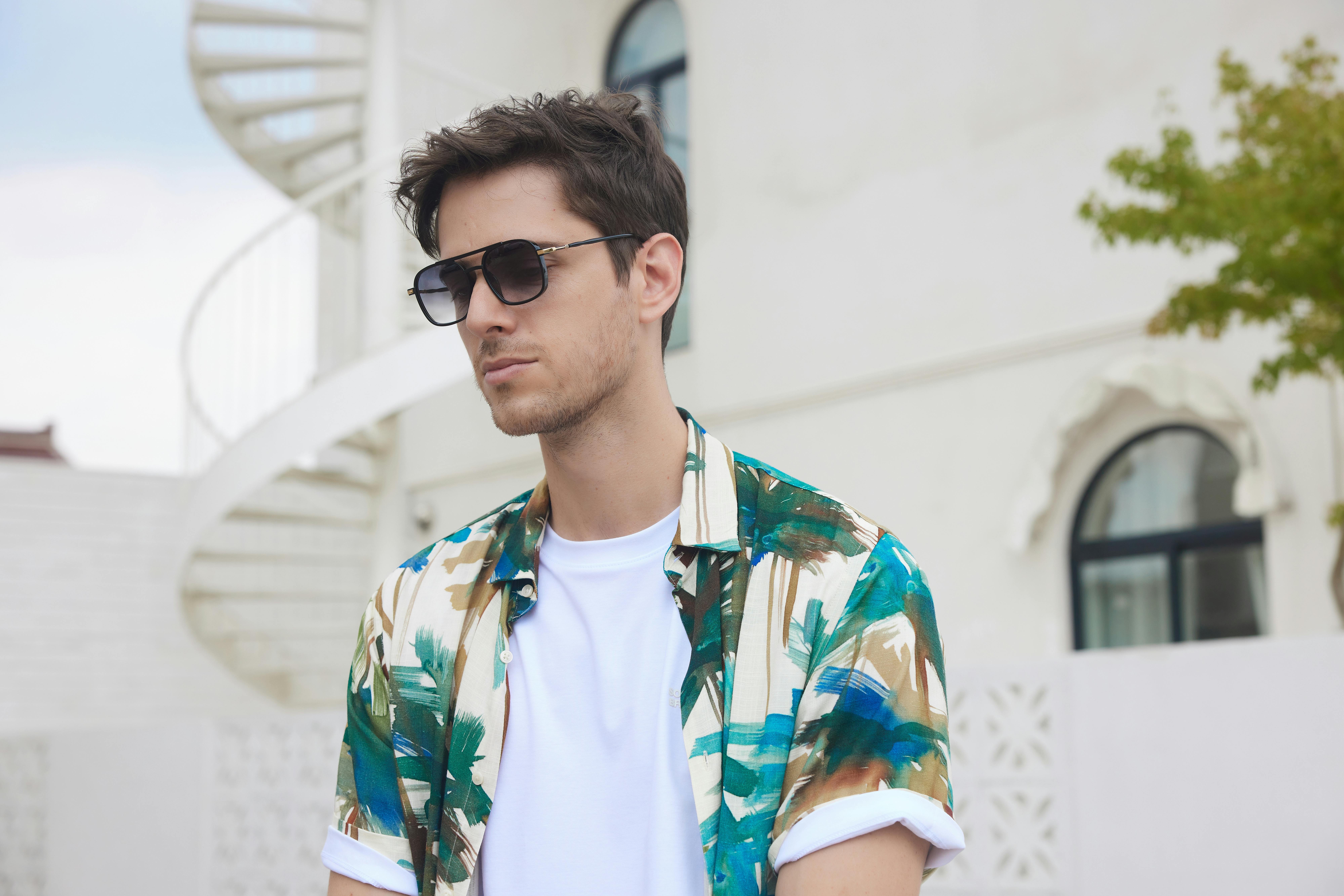 Tropical Cool: Stylish Layers and Sophisticated Sunglasses