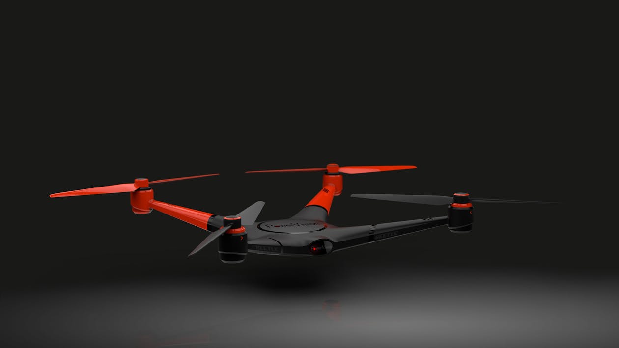 Gray and Red Quadcopter Drone