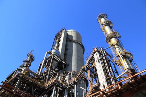 Low Angle Shot of Manufacturing Plant under Blue Sky 