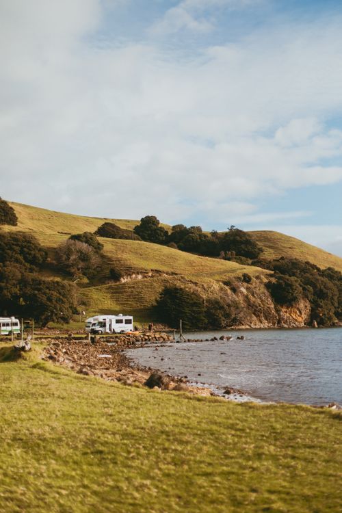 Free Beautiful coastal view with greenery and hills in Coromandel, Waikato, New Zealand. Stock Photo