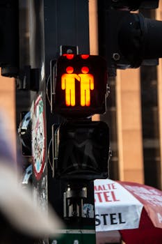 Close-up of a red pedestrian signal at an intersection in São Paulo, Brazil.