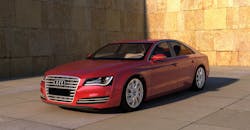 一辆时尚的红色汽车停在城区的石墙边