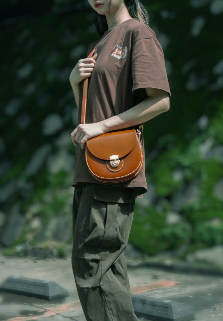 Woman With Brown Purse 