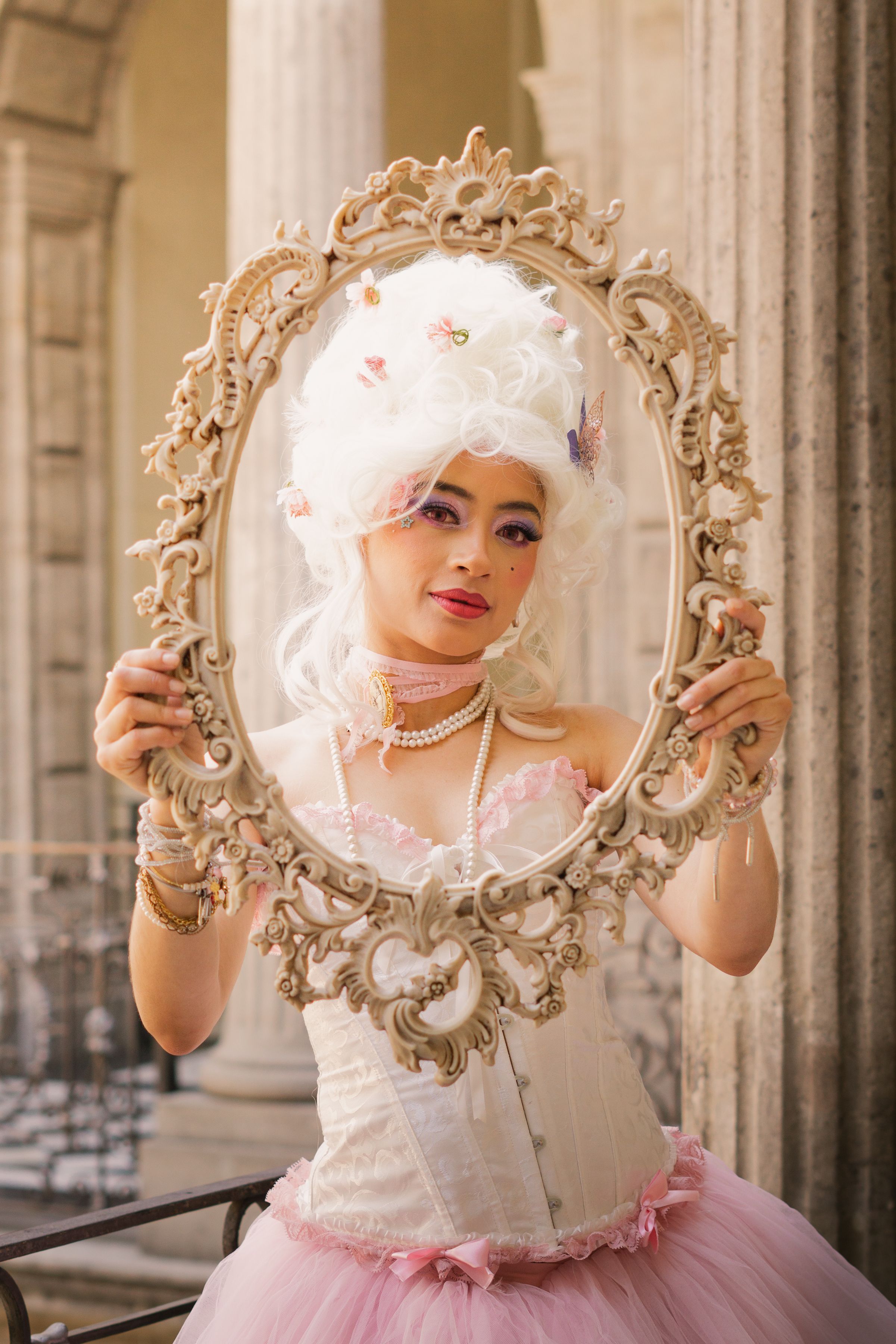 Woman in Flapper Dress and Wig Holding Mirror Frame · Free Stock Photo