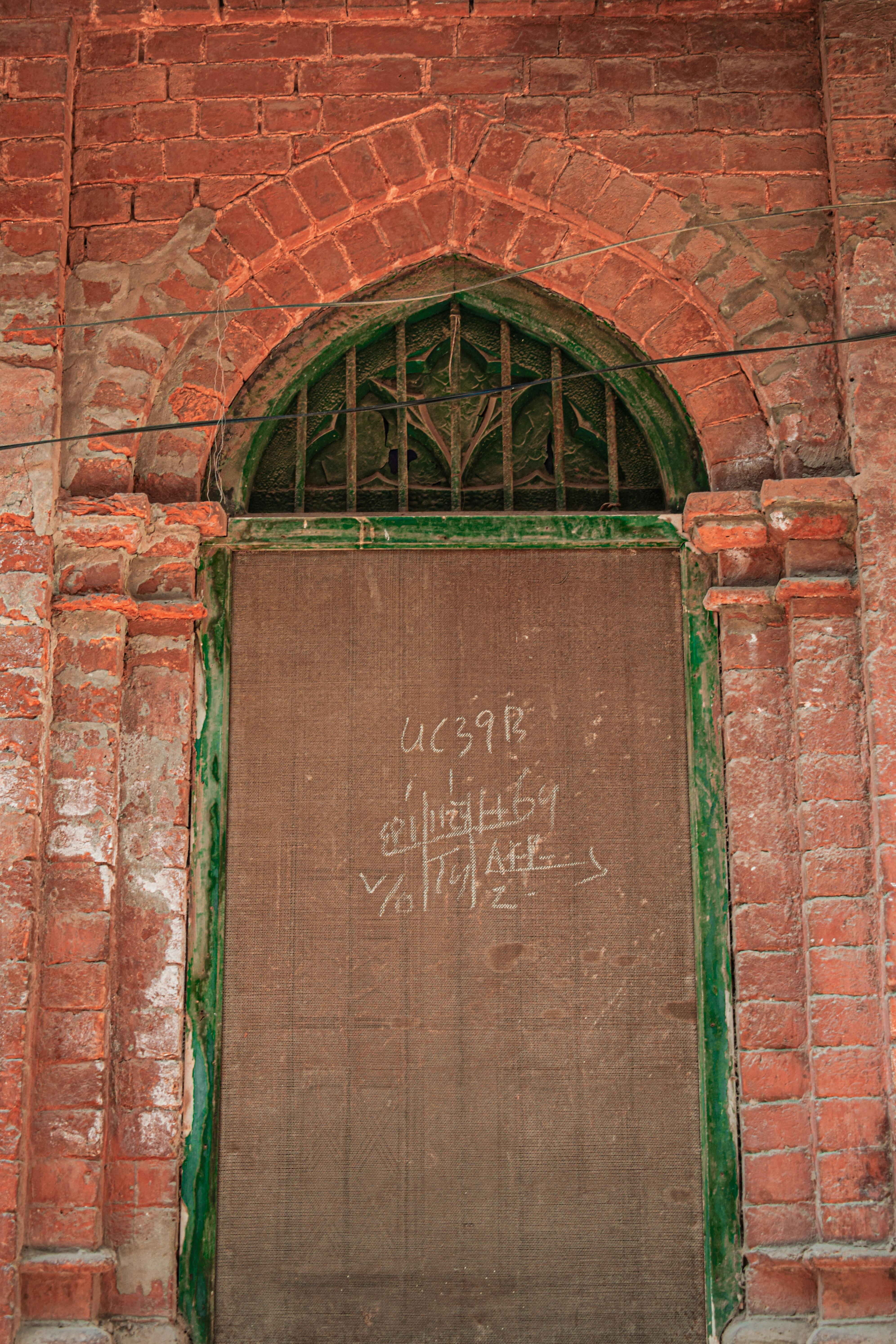 chalk markings on a wooden door